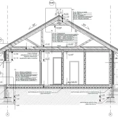 Przekrój budynku z detalami konstrukcyjnymi, uwzględniający projekt architektoniczno budowlany.
